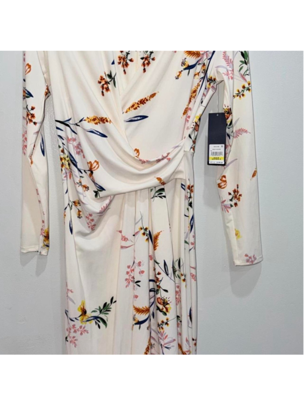 Rachel Roy floral wrap dress with wrap front, long sleeves, and a flowy silhouet
